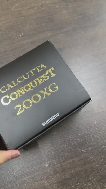 Nova Carretilha Shimano Calcutta Conquest Md 300/301 Xglh - Frete Grátis